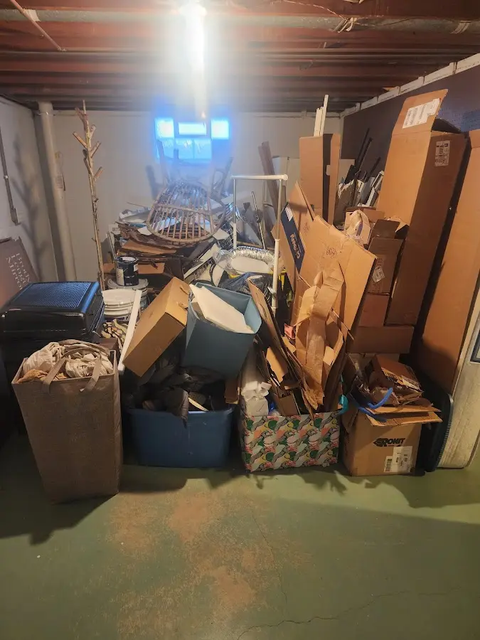 Roll-off dumpster container at job site for 20 Yard Dumpster Rental in Saranac Lake